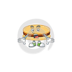 A mascot design of brown alfajor making a surprised gesture