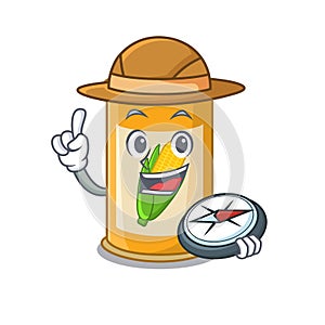 Mascot design concept of corn tin explorer using a compass in the forest