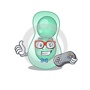 Mascot design concept of serratia marcescens gamer using controller