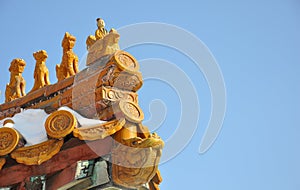 Mascot on the golden roof