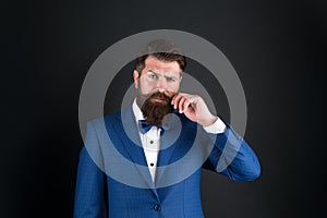 Masculine aesthetic. Looking good does not have to take too much effort. Well groomed man with beard in suit jacket