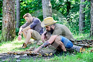 Masculinity concept. Ultimate guide to bonfires. How to build bonfire outdoors. Men on vacation. Man brutal bearded