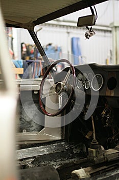 Maserati Mexico during restoration with a wooden steering wheel photo