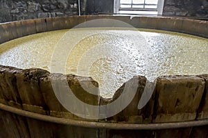 Mash in oak fermentation barrels