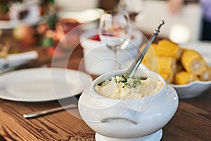 Mash potato, food and lunch for Christmas on a dining room table for celebration, nutrition and health. Healthy eating