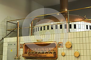 Mash tun and wort siphoning valves in brewery.