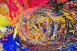 Mashed colorful oil paint with powder pigments photo
