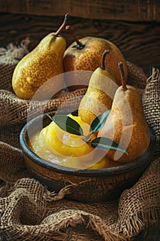 mashed pears on a burlap background. selective focus