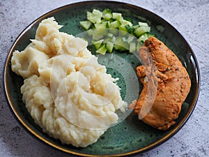 Mashed potato, Barbeque chicken and cucumber meal
