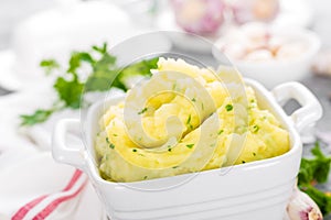 Mashed potato. Potato mash with garlic and parsley. Boiled potato. Potato puree