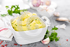 Mashed potato. Potato mash with garlic and parsley. Boiled potato. Potato puree