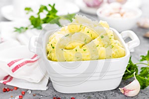 Mashed potato. Potato mash with garlic and parsley. Boiled potato. Potato puree