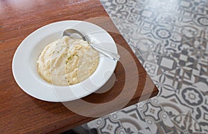 Mashed potato with a spoon