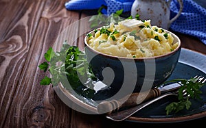 Mashed potatoes in blue bowl
