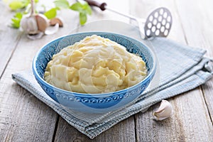 Mashed potatoes in blue bowl photo