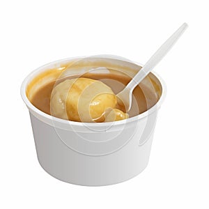 Mashed potatoes in a bowl isolated on white background. Cup of smooth potato puree with spoon. Clipping path