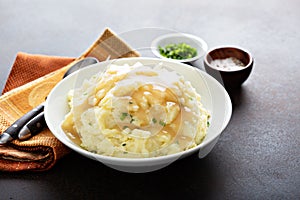 Mashed potatoes with gravy for Thanksgiving or Christmas photo