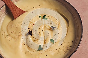 Mashed potatoes, with micro greenery and spices, homemade, on a beige table, no people, top view,