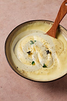 Mashed potatoes, with micro greenery and spices, homemade, on a beige table, no people, top view,