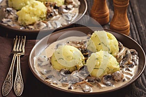 Mashed potatoes with mushroom gravy, vegetarian food.