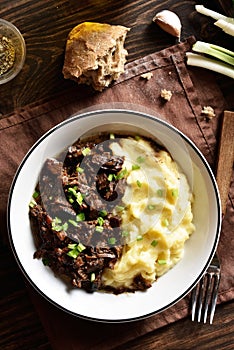 Mashed potatoes and slow cooked beef