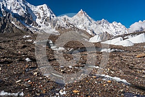 Masherbrum mountain or K1 peak in Karakoram mountains range view from Goro II campsite, K2 base camp trekking route, Gilgit