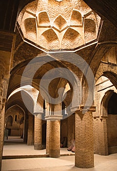Masjed-e Jameh Mosque Ceiling with Roof Circle Window and Muqarna. Beautiful oldest iranian mosque dome interior design