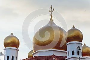 Masjid Bukit Bendera Penang Hill Mosque at evening from Penang Hill at George Town. Penang, Malaysia photo