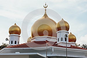 Masjid Bukit Bendera Penang Hill Mosque at evening from Penang Hill at George Town. Penang, Malaysia photo