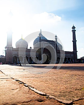 Masjid-i Jehan-Numa with the bright sun shining in the sky