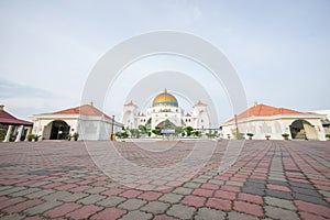 Masjid Selat Melaka or Malacca Straits Mosque during a beautiful sunrise.