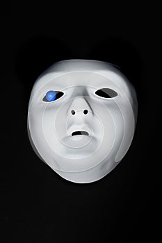 Mask with blue eye