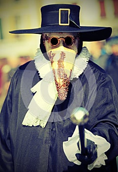 mask called Plague doctor costume and the long beak served as a