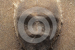 Mask covered by crystal fabric.