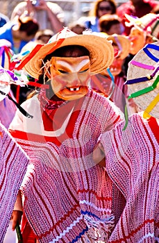 Mask dance under the sun