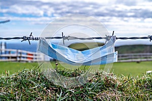 Mask in Fence at the Silver Strand in County Donegal - Ireland