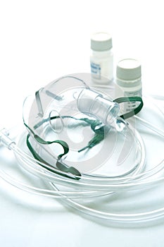 Mask and liquid medicine with a nebulizer.