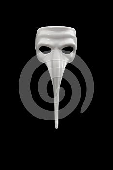 Mask with long nose is isolated on black