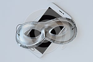 Mask on mobile phone - Concept of privacy, security and anonymity of mobile phones