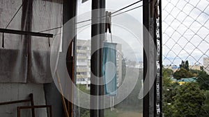 The mask from the virus hangs and dries after washing on the balcony