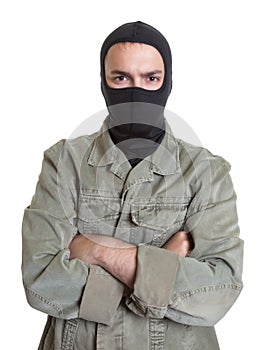 Masked burglar with crossed arms
