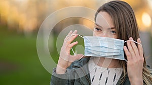 Masked girl on an empty street in the USA. Coronavirus. Pandemic epidemic. Outbreak of illness. Media and news publishers, ban on
