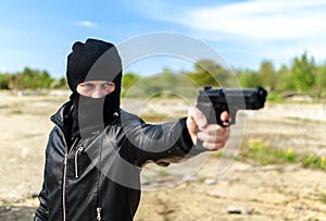 Masked gunman