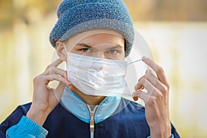 Masked man from coronavirus and air. Protection against PM 2.5 air polluted from thea  virus in Europe and Asia