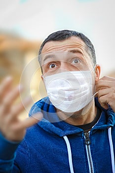 Masked man from coronavirus and air. Protection against PM 2.5 air polluted from thea  virus in Europe and Asia