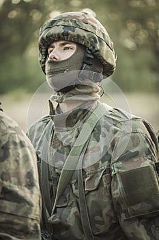 Masked soldier in military uniform