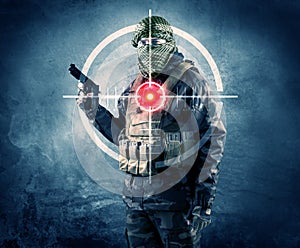 Masked terrorist man with gun and laser target on his body