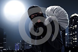 Masked thief escape at night