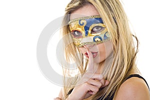 Masked woman making silence gesture