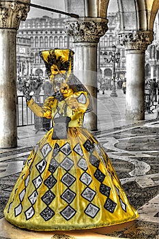 The masked yellow costume in Venice